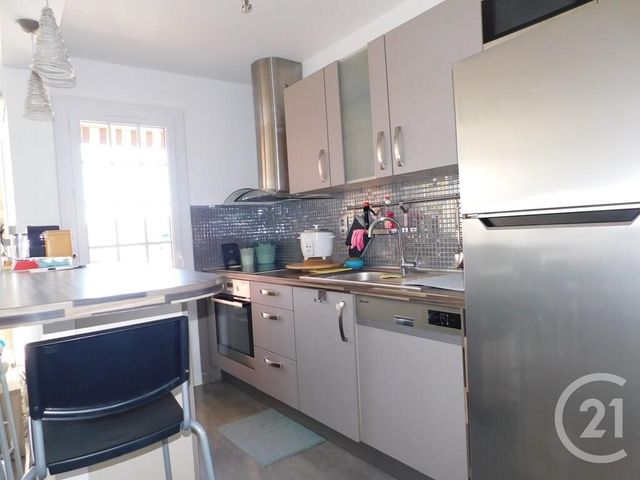 Afficher la photo en grand Appartement T3 à louer - 3 pièces - 62.43 m2 - VALLAURIS - 06 - PROVENCE-ALPES-COTE-D-AZUR - Century 21 Liberté