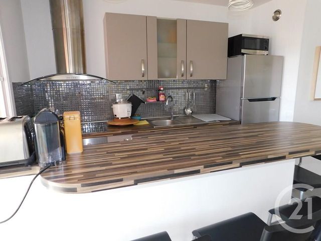 Afficher la photo en grand Appartement T3 à louer - 3 pièces - 62.43 m2 - VALLAURIS - 06 - PROVENCE-ALPES-COTE-D-AZUR - Century 21 Liberté